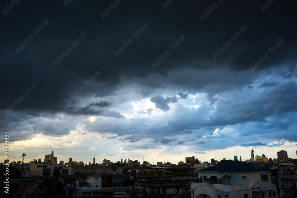 Dark blue storm clouds over city in rainy season