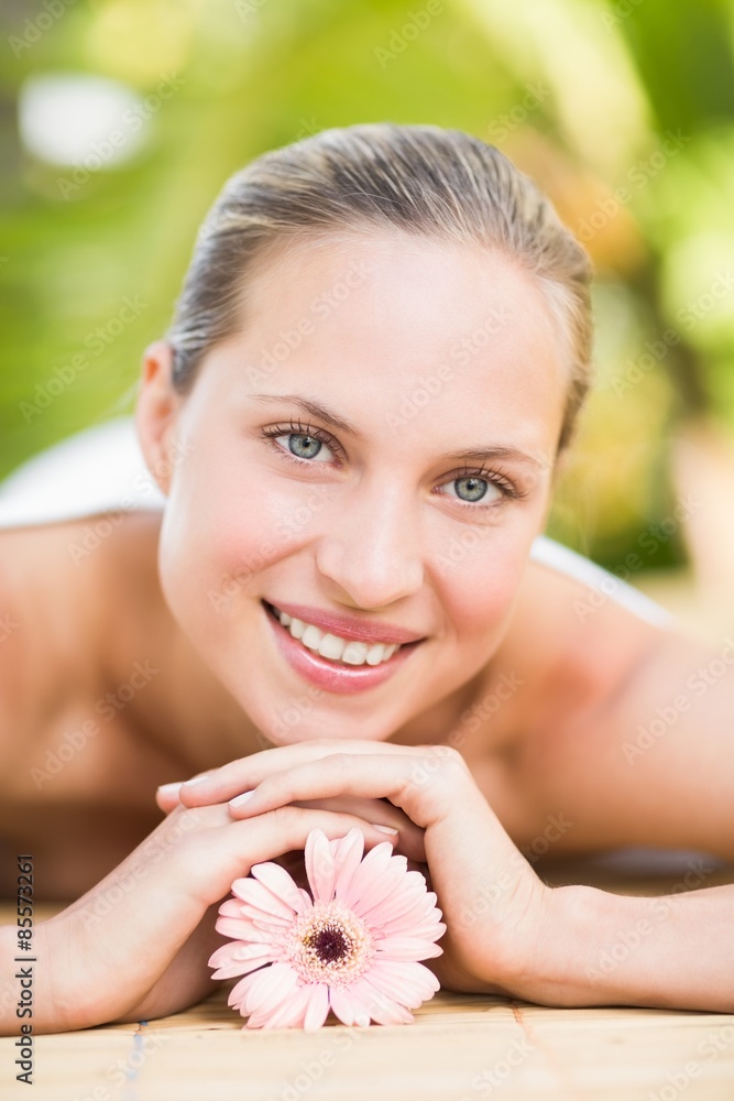 Attractive woman getting massage on her back Attractive woman getting massage on her back