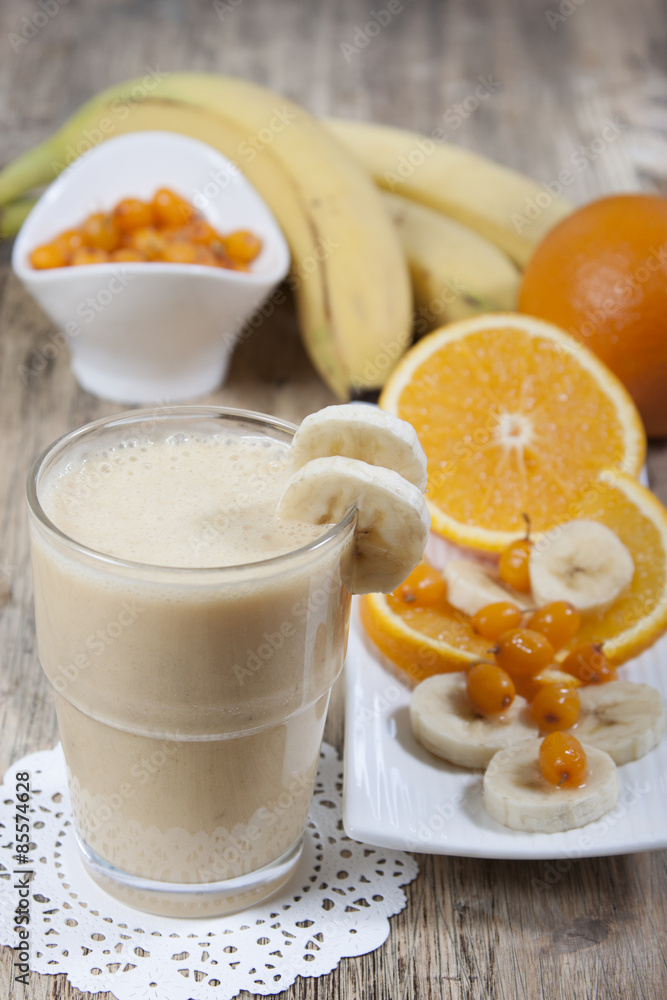 Smoothie of banana, orange juice , frozen sea-buckthorn with y Smoothie of banana, orange juice , frozen sea-buckthorn with y