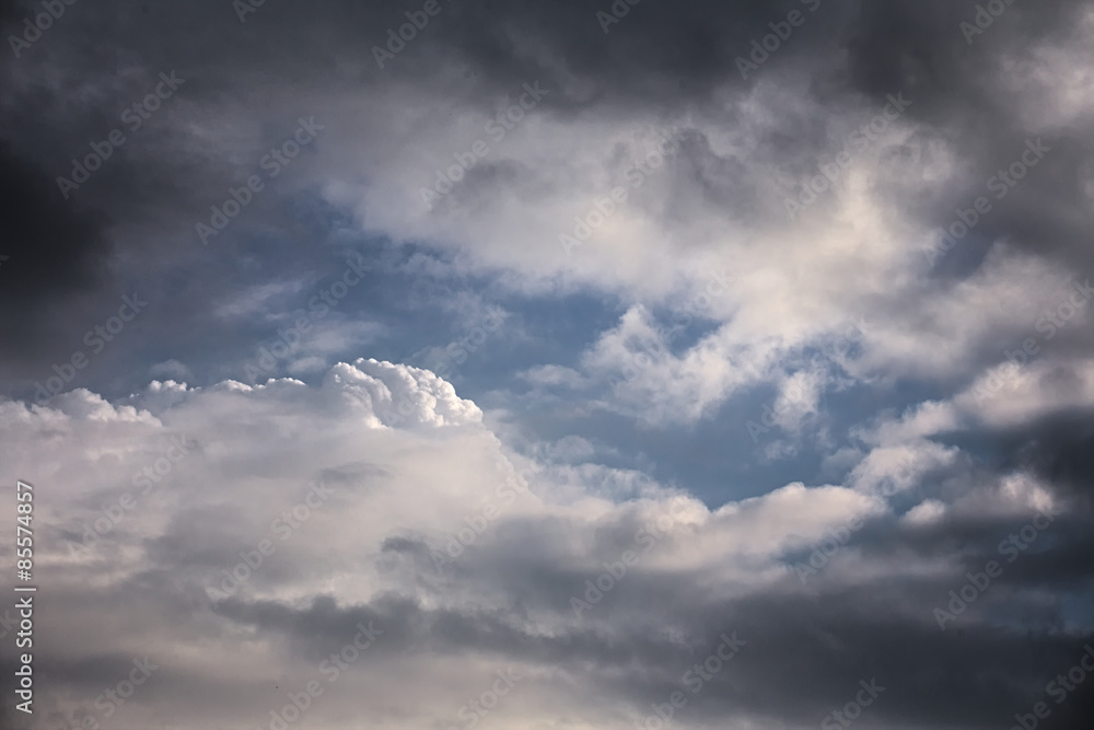High contrast cumulus cloudscape with blue sky