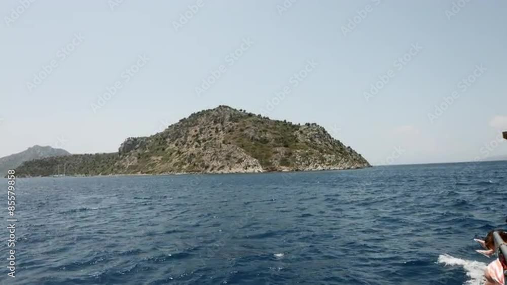 Aegean sea landscape view of water and cliff mountains. 4K RAW Aegean sea landscape view of water and cliff mountains. 4K RAW