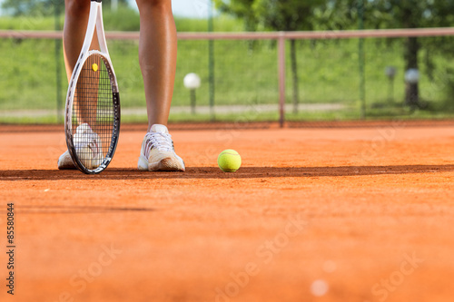 Obraz na plátně Legs of female tennis player.Close up image.