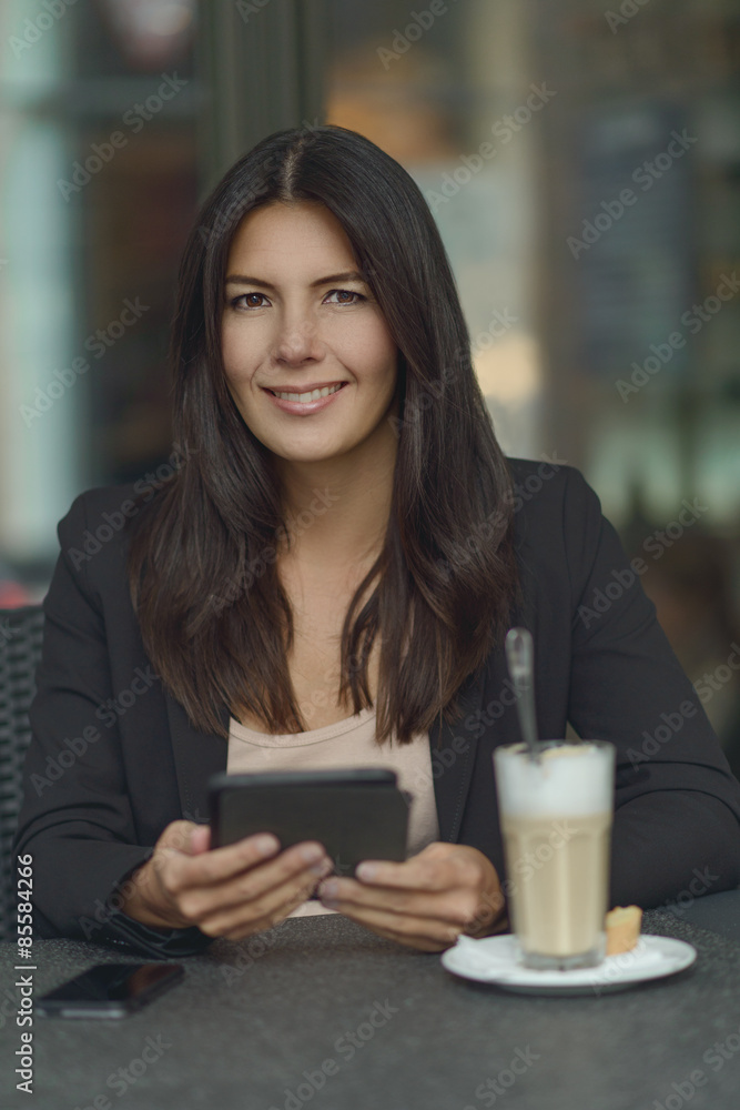 Smiling woman in coffee shop Smiling woman in coffee shop