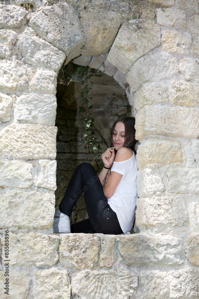Young beautiful girl with brown hair outdoor portrait Young beautiful girl with brown hair outdoor portrait