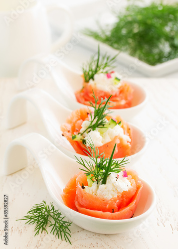 Fototapeta Naklejka Na Ścianę i Meble -  Appetizer of salted salmon and ricotta.