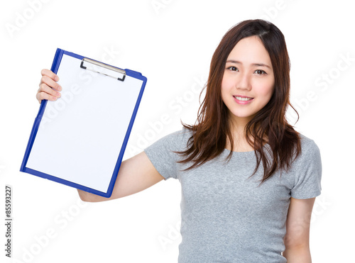 Woman show with blank page of clipboard