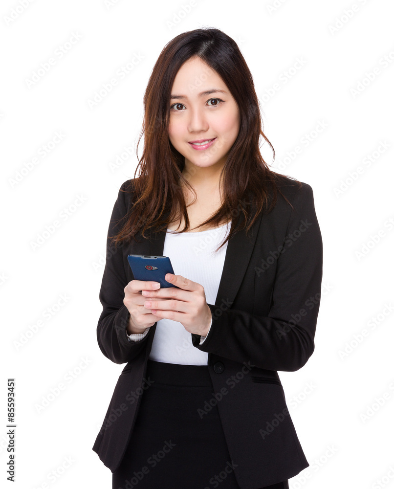 Asian businesswoman use of cellphone Asian businesswoman use of cellphone