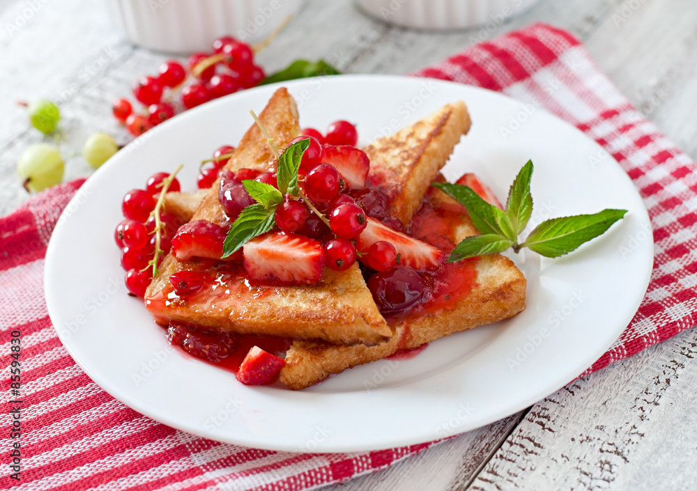 French toast with berries and jam for breakfast French toast with berries and jam for breakfast