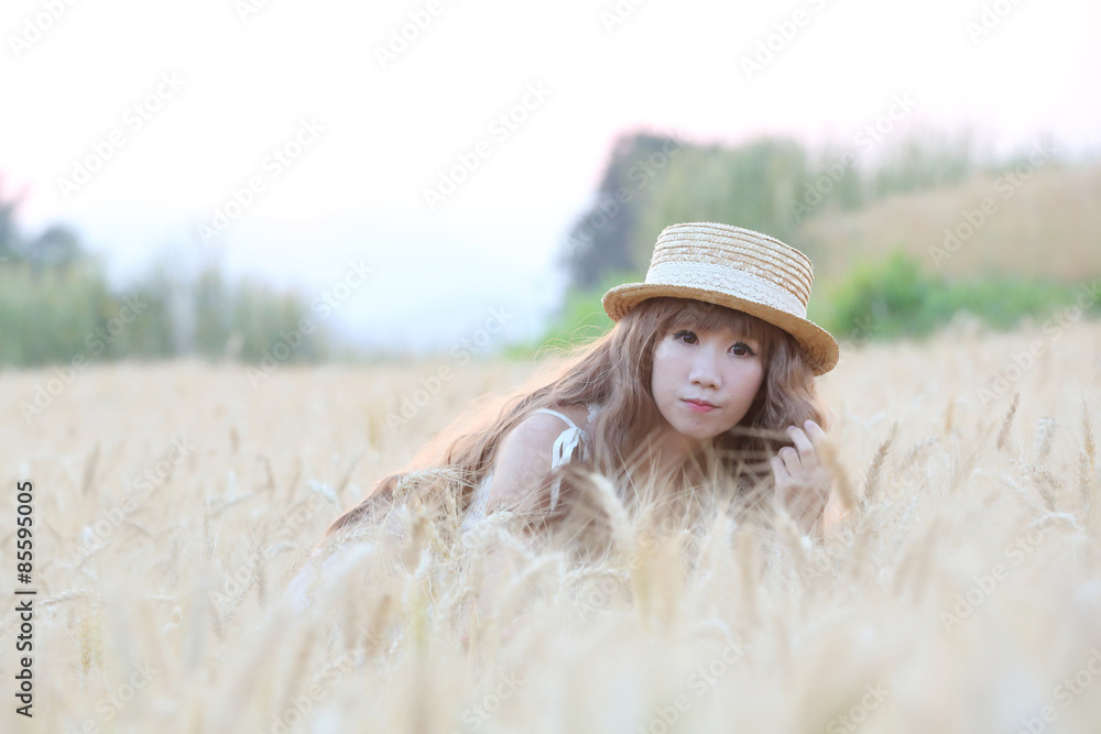 Asian girl on wheat
