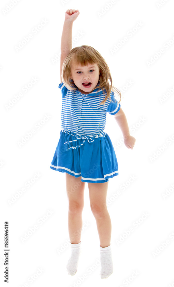 Little girl jumping lifting the arm up Little girl jumping lifting the arm up