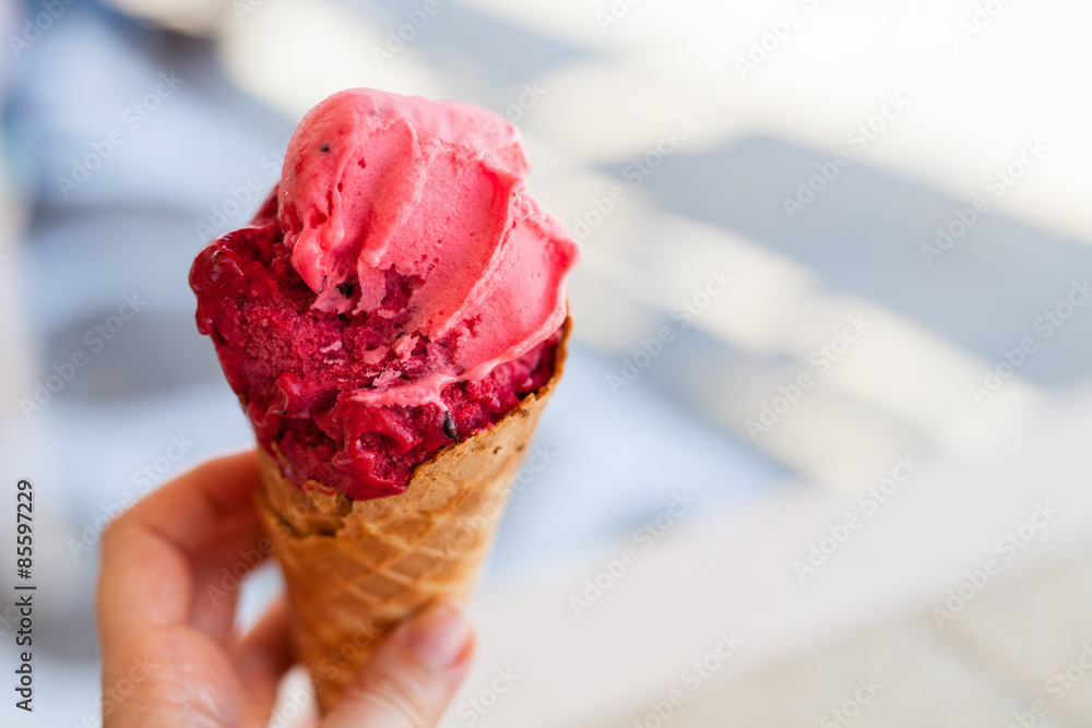 Raspberry sorbet in a fresh waffle cone - obrazy, fototapety, plakaty 