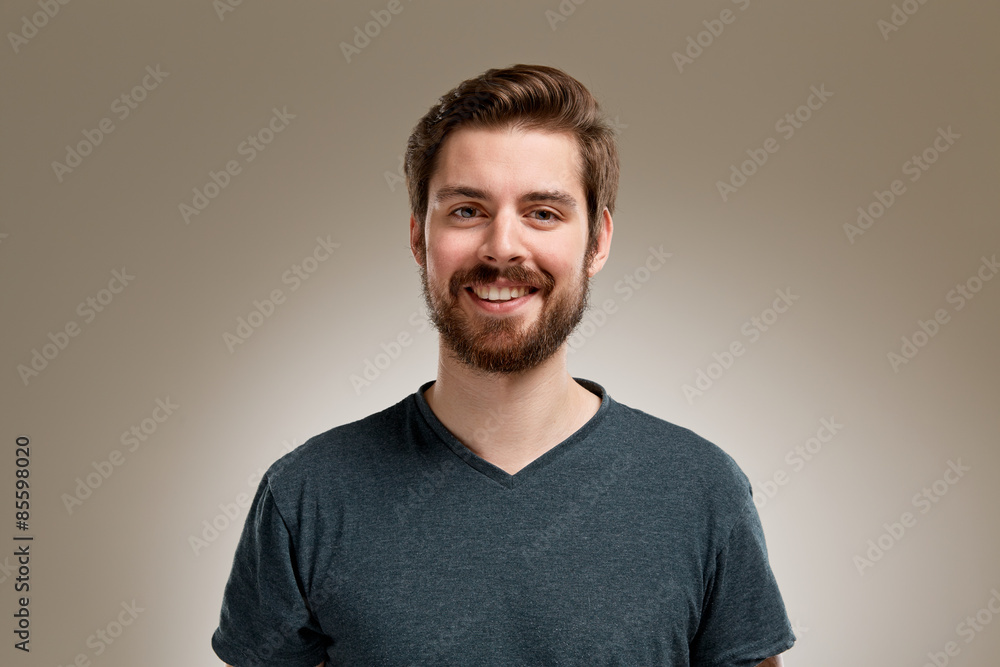 Portrait of smiling young man with beard Portrait of smiling young man with beard