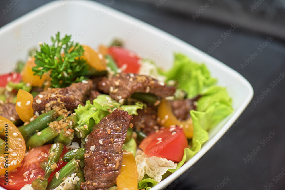 Warm salad with veal