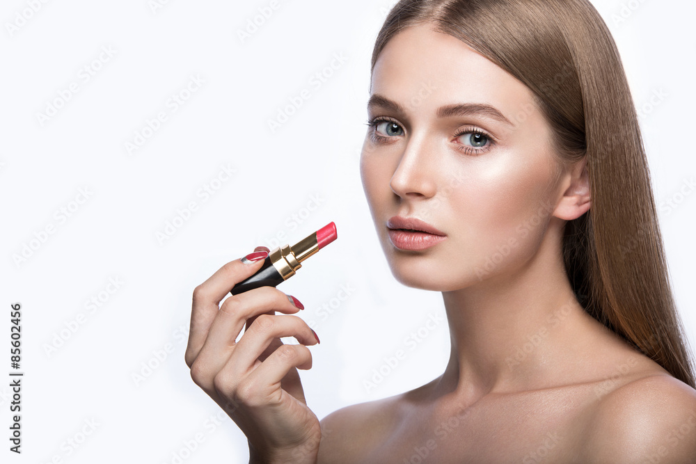 Charming young babe with lipstick and light makeup. Picture taken in the studio.Beauty face Charming young babe with lipstick and light makeup. Picture taken in the studio.Beauty face