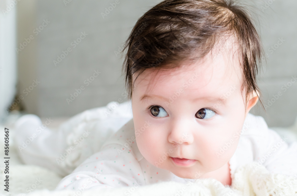 Portrait of cute caucasian little baby girl in backlight Portrait of cute caucasian little baby girl in backlight