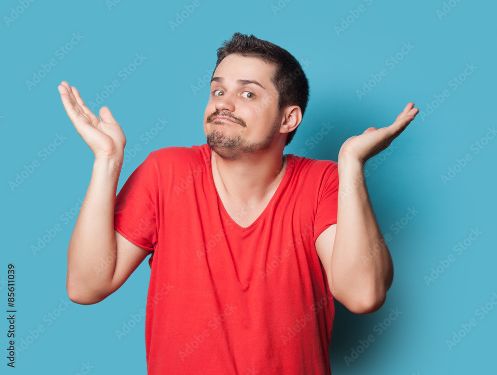 young surprised guy in t-shirt young surprised guy in t-shirt