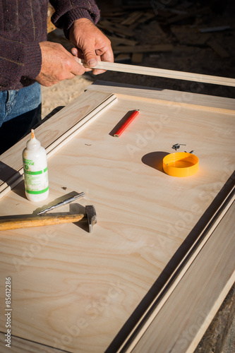 Handcrafted wooden door in carpentry.