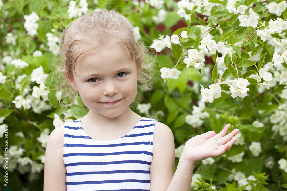 Close up portrait of a six year little girl, against background Close up portrait of a six year little girl, against background