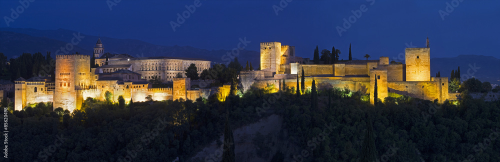 Granada - panorama of Alhambra palace dusk.
