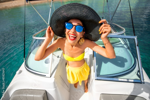 Woman having fun on the yacht
