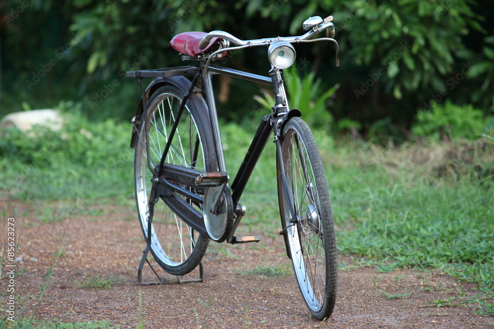 vintage bicycle on dirt road