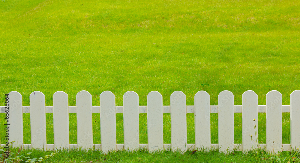 wooden fence in the grass. wooden fence in the grass.