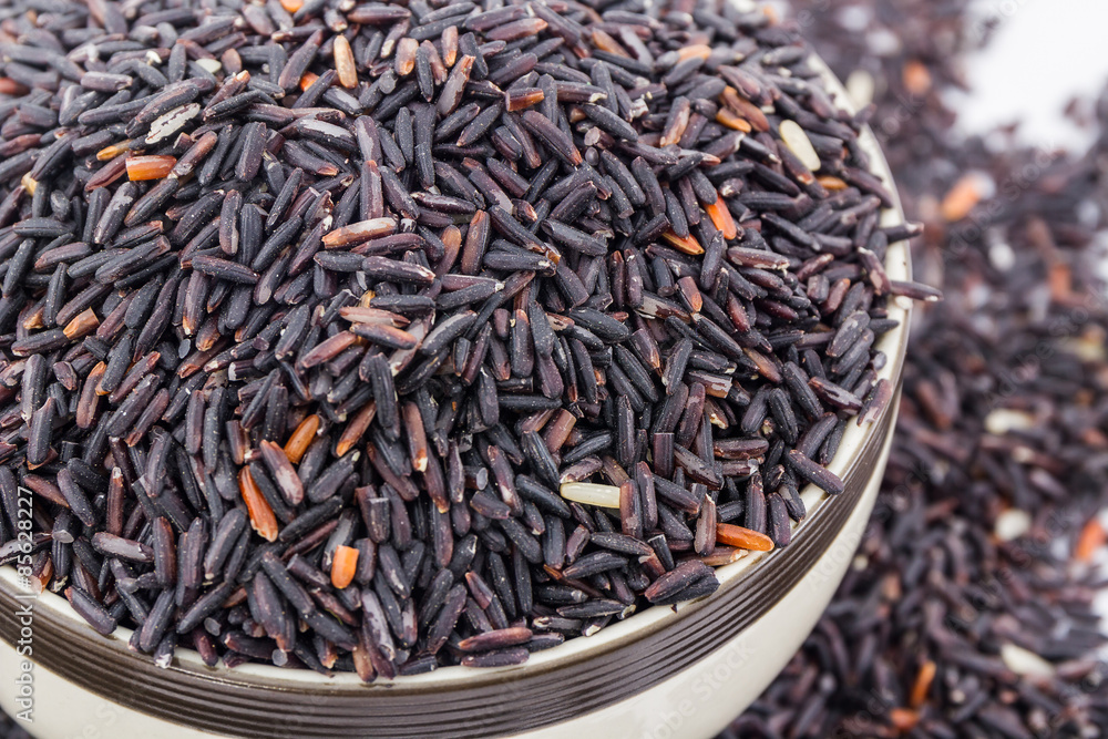 Rice berry in a bowl . Rice berry in a bowl .