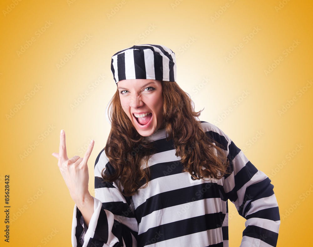 Convict criminal in striped uniform Convict criminal in striped uniform