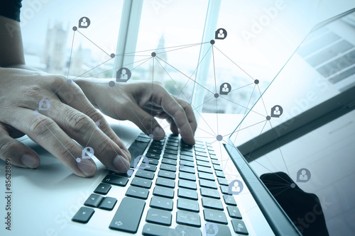 businessman hand working with business documents on office table photo