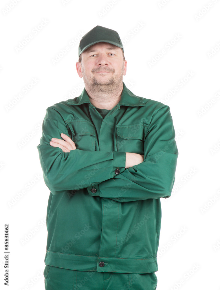 Worker in green overalls. Worker in green overalls.