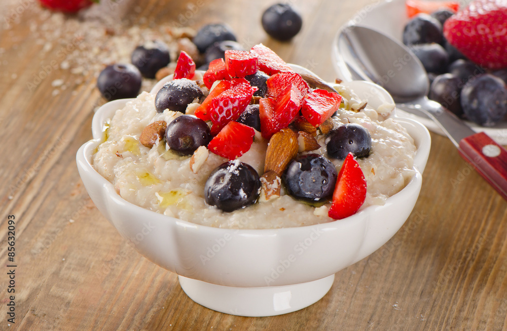 Oatmeal with Berries and nuts for a Healthy Breakfast. Oatmeal with Berries and nuts for a Healthy Breakfast.