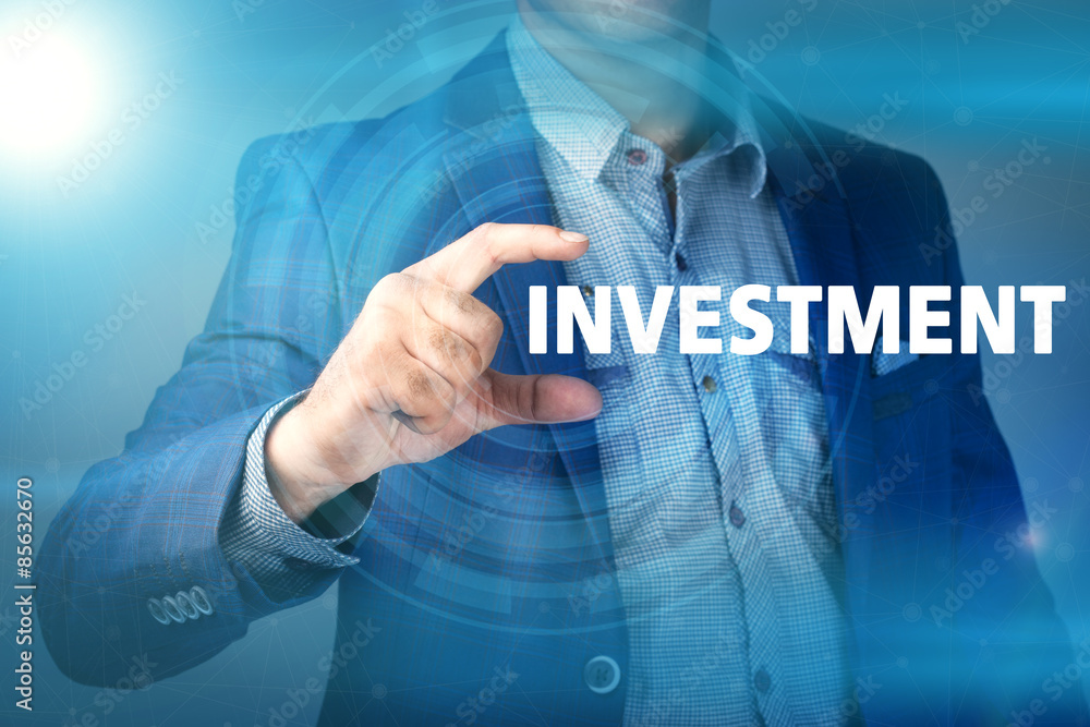 Businessman presses button investment on virtual screens. Busine Businessman presses button investment on virtual screens. Busine
