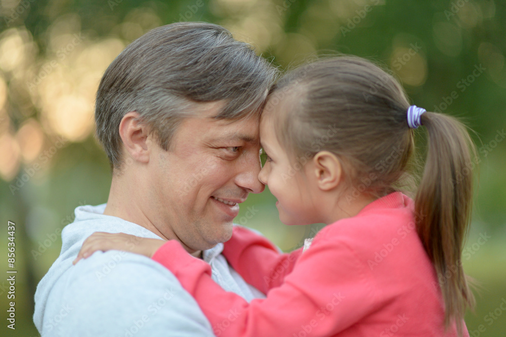 Happy Caucasian father holding his daughter Happy Caucasian father holding his daughter