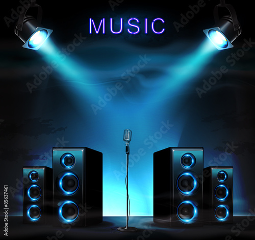 Stage with audio speakers, microphone, spotlight and sparkles.