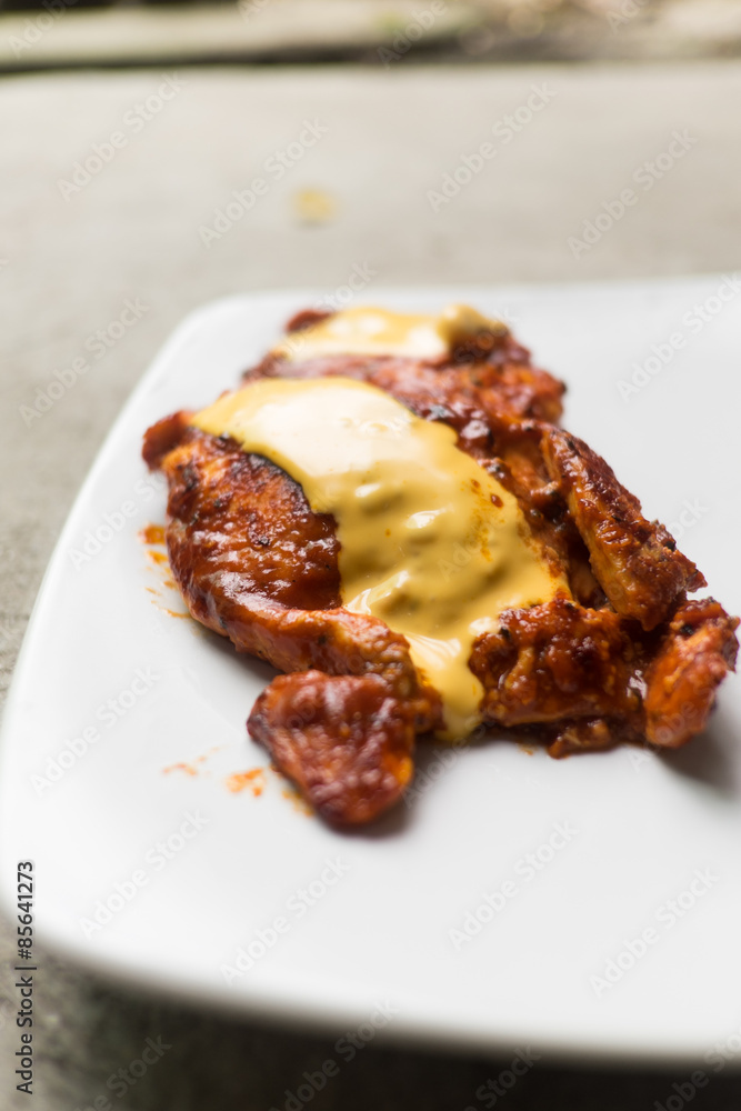 Barbecue grilled chicken breasts with Cheddar cheese