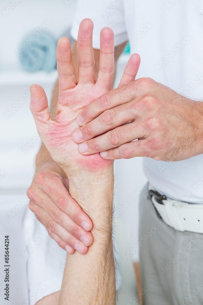 Fototapeta premium Physiotherapist doing hand massage 