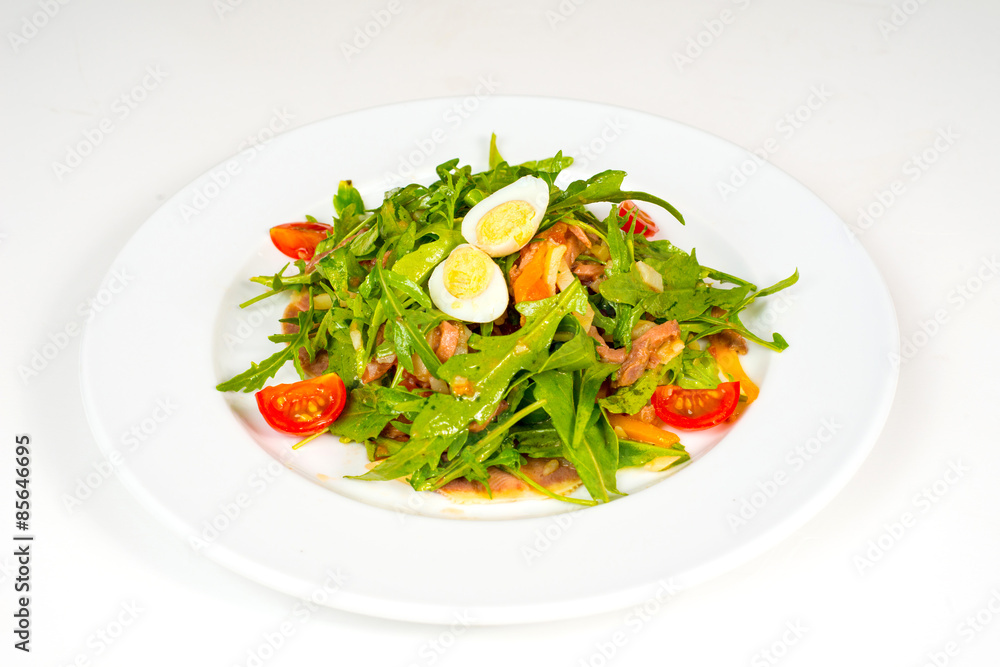 Pashot egg and salad with backed duck, rucola, cherry tomatoes