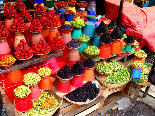 Colorful fruit and vegetable market in Mexico. This particular market is used mostly by the locals for their everyday shopping for groceries and household items.