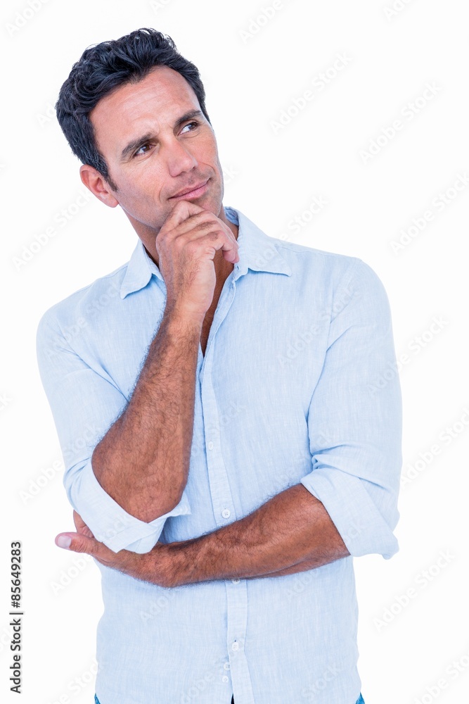 Handsome man thinking with finger on chin Handsome man thinking with finger on chin