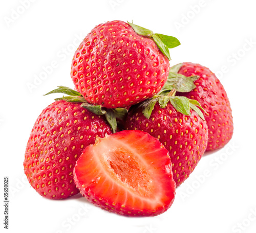 Red strawberries with green leaves, isolated
