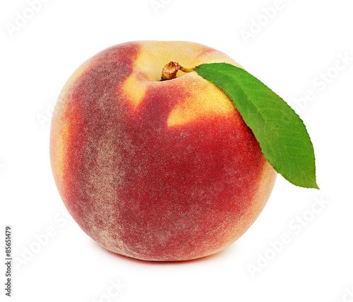 One whole ripe peach with green leaf (isolated)