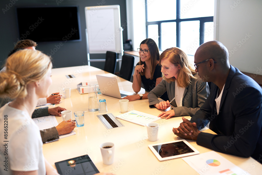 Group of young executives having a work meeting Group of young executives having a work meeting