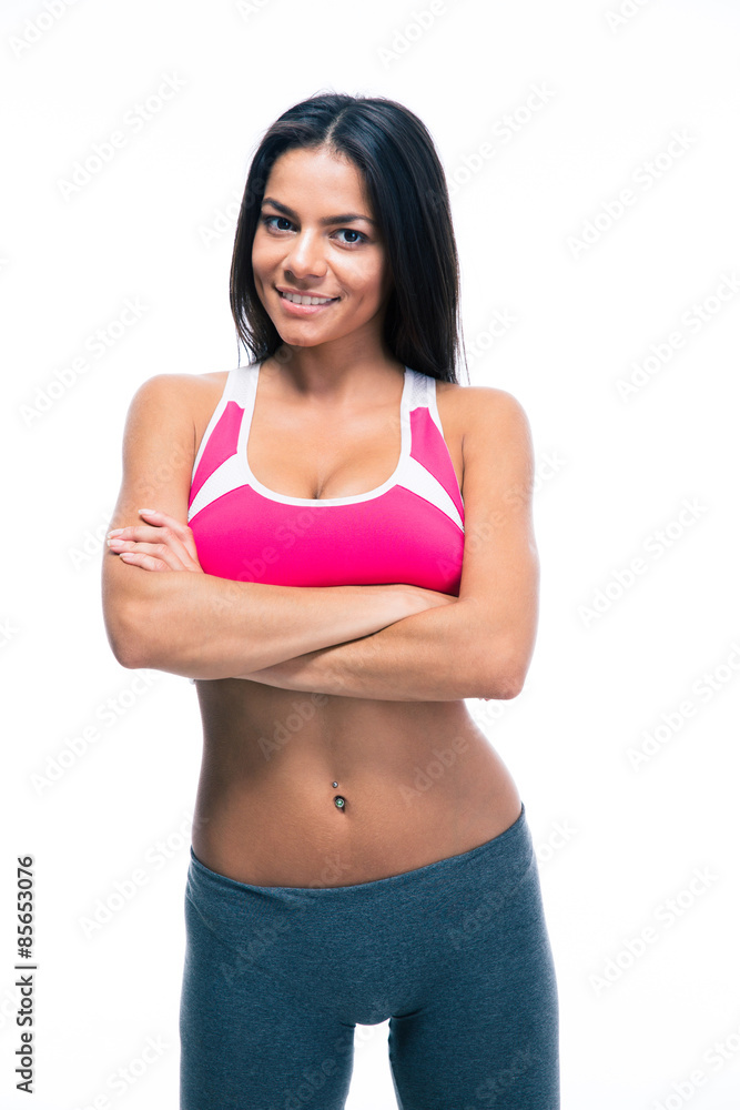 Sporty woman standing with arms folded Sporty woman standing with arms folded