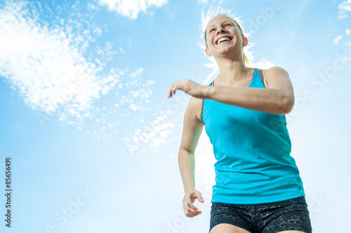 Beautiful young woman jogging