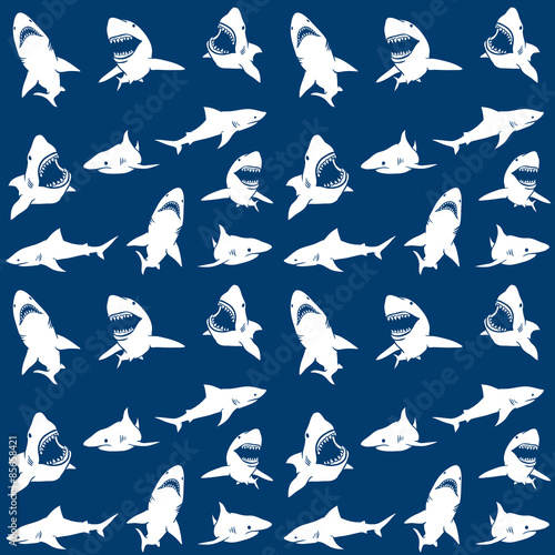 Sharks silhouettes seamless pattern. white on blue Background.