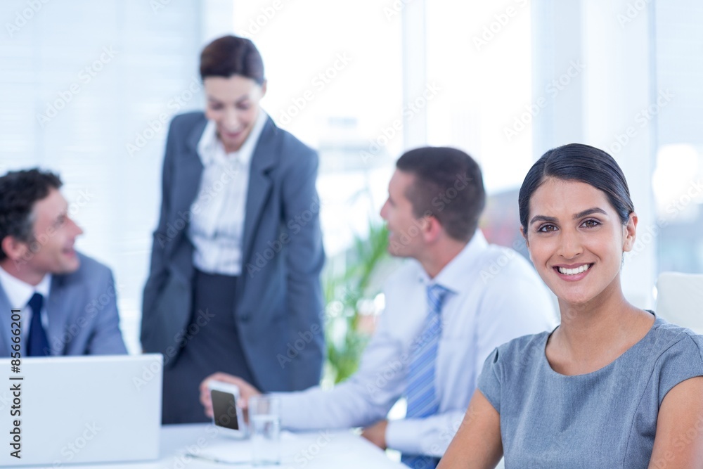 Smiling businesswoman looking at camera Smiling businesswoman looking at camera