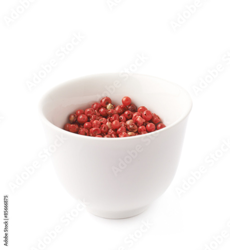 Cup filled with the pepper seeds