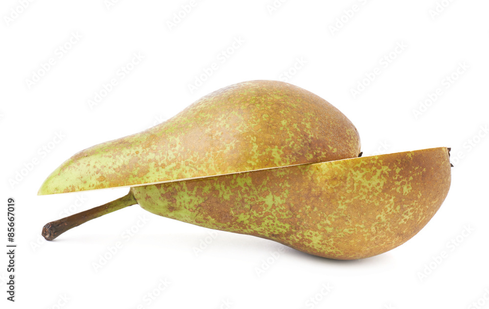 Fototapeta premium Green pear cut in half isolated