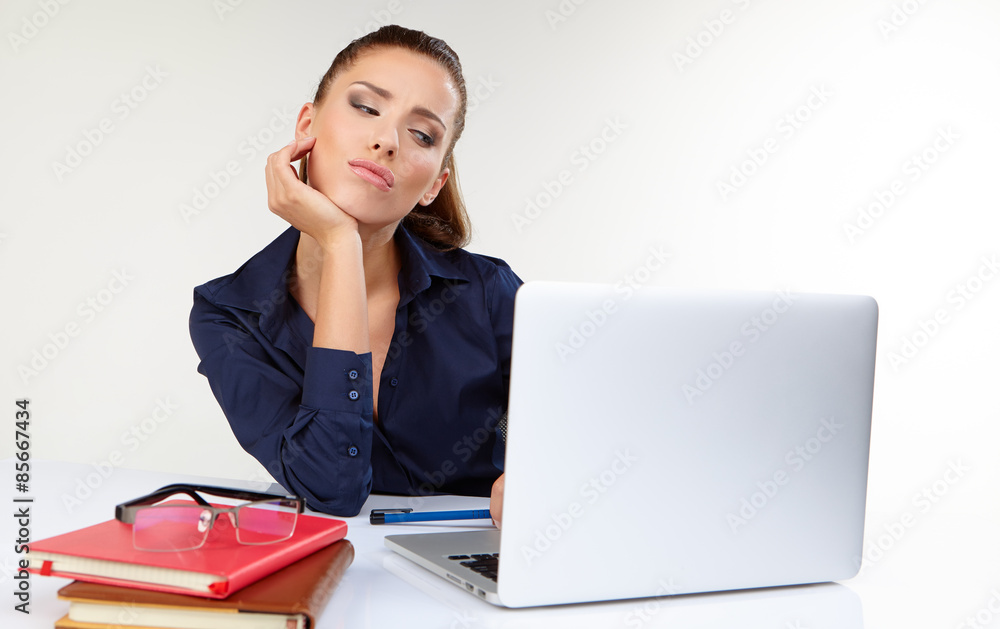 Woman with a laptop - isolated over a white background Woman with a laptop - isolated over a white background