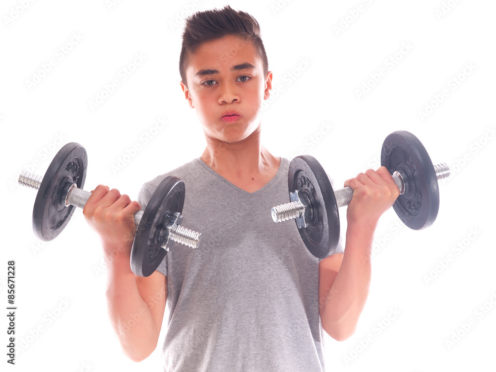teenage boy exercising with dumbbells teenage boy exercising with dumbbells